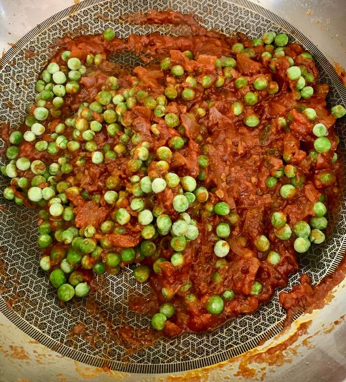 Step 1.1: Add the peas and stir well for 2-3 minutes
