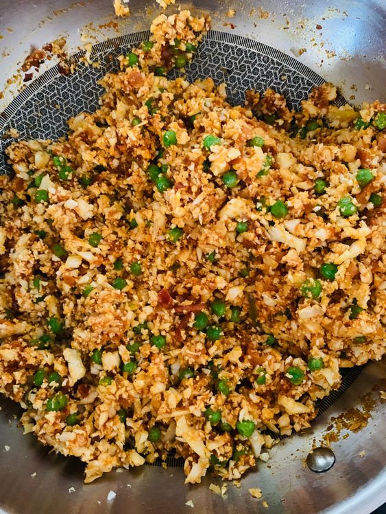 Step 1.1: Add the minced cauliflower, mix well, and cook on high heat for 3-4 minutes