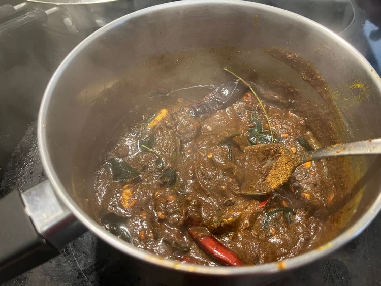 Step 5.1: Add pulihora podi and tempering