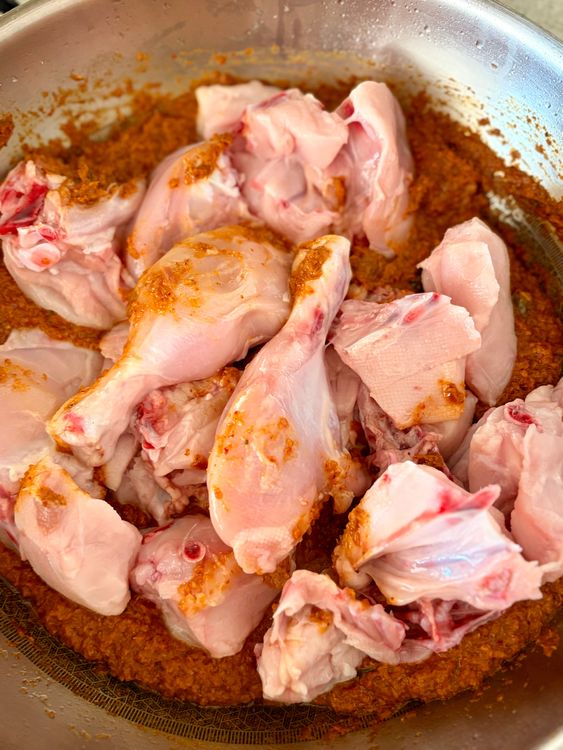 Step 2.1: Add the chicken and cook on high heat for 3ā4 minutes, coating each piece well in the masala