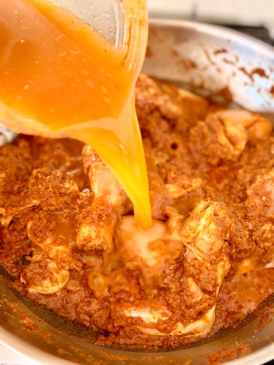 Step 2.1: Pour in the reserved masala rinse water, add salt, and bring to a boil