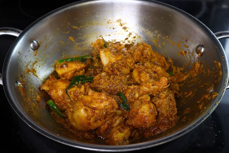 Step 3.7: Add slit green chilies, curry leaves, mint leaves, and the ground masala powder
