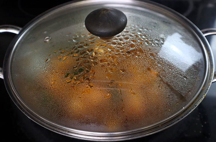 Step 3.2: Cover and cook for 5 minutes until oil releases