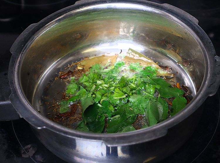 Step 1.3: Add curry leaves and coriander leaves