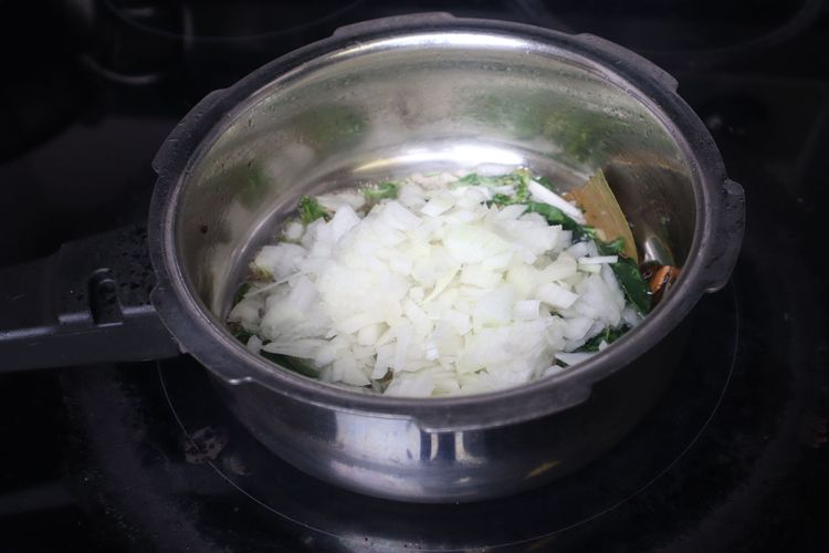 Step 1.2: Add chopped onions and sauté until they become soft