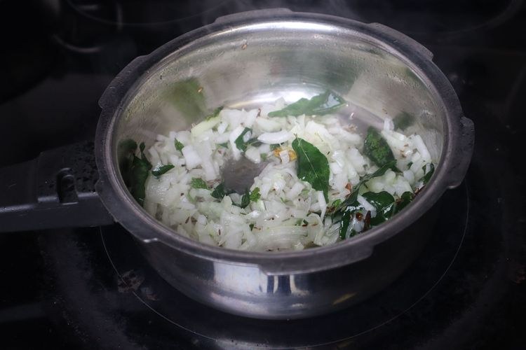 Step 1.3: Add chopped onions and sauté until they become soft