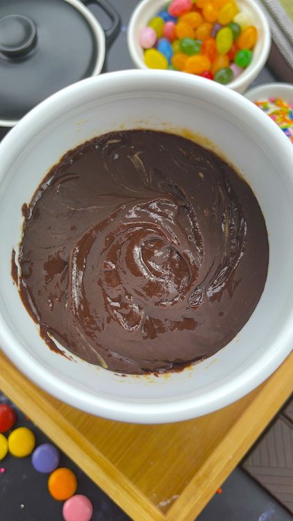 Step 4.1: Pour batter into the mug over the peanut butter base