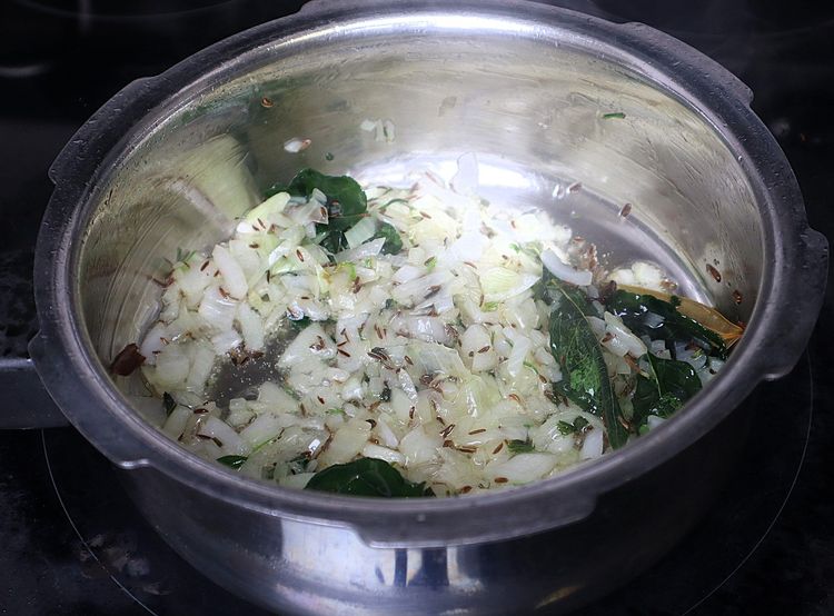 Step 1.5: Add sliced onions and sauté until they are soft and change color