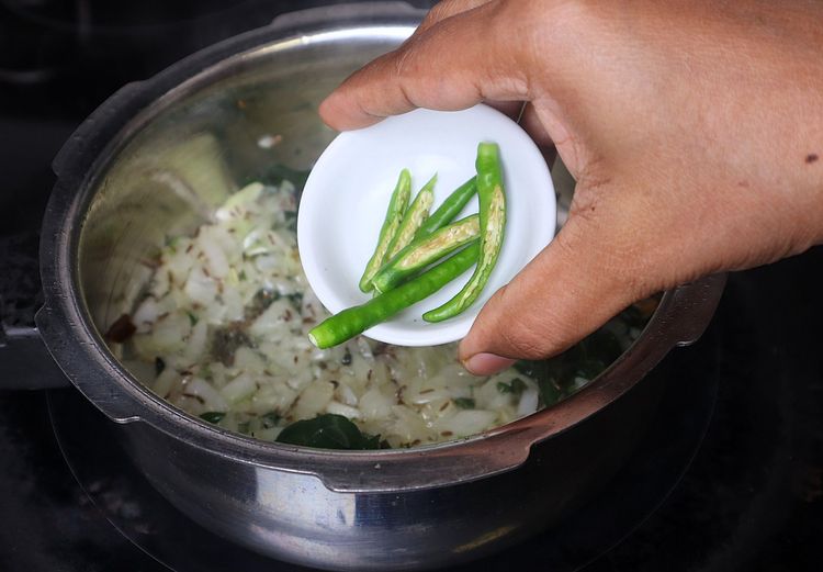 Step 1.1: Add green chillies, ginger and garlic paste, and sauté until the raw smell disappears