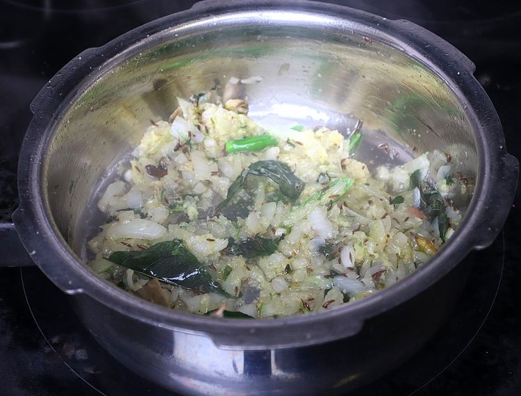 Step 1.3: Add green chillies, ginger and garlic paste, and sauté until the raw smell disappears