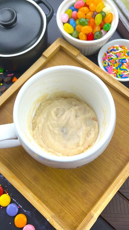 Step 1.1: Cover the jam with the remaining batter — do not mix it in; we want that jammy surprise!
