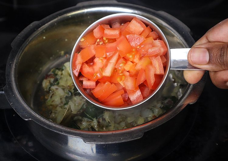 Step 1.1: Add chopped tomatoes and cook for a few minutes
