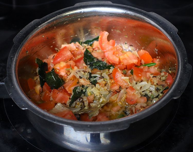 Step 1.3: Add chopped tomatoes and cook for a few minutes