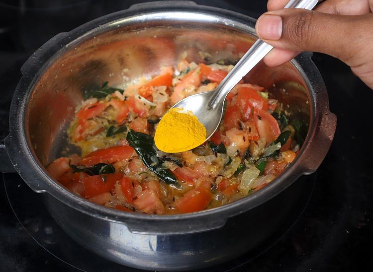 Step 1.1: Add turmeric powder and salt