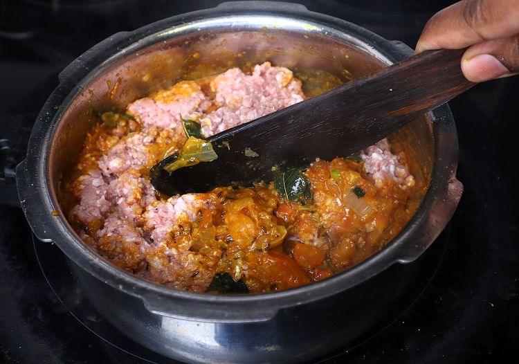 Step 1.2: Add washed and drained keema and roast for a few minutes on medium to low flame