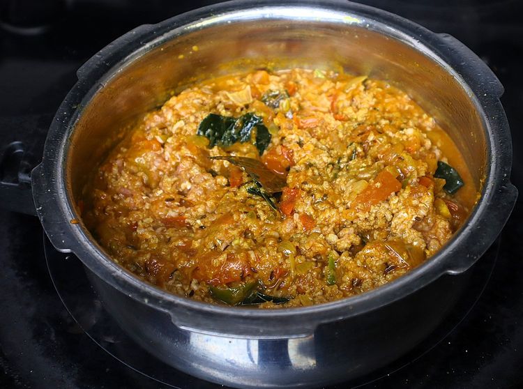 Step 1.4: Add washed and drained keema and roast for a few minutes on medium to low flame