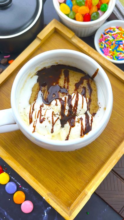 Step 3.1: Top with whipped cream, chocolate drizzle, and a sprinkle of clove powder