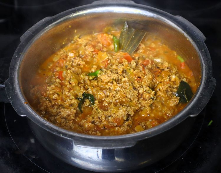 Step 1.5: Add washed and drained keema and roast for a few minutes on medium to low flame