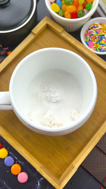 Step 1.1: In a large microwave-safe mug, combine flour, sugar, baking powder, and salt