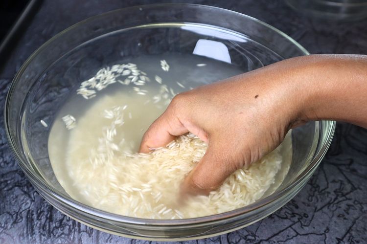 Step 1.5: Add basmati rice to a mixing bowl and rinse it 2-3 times