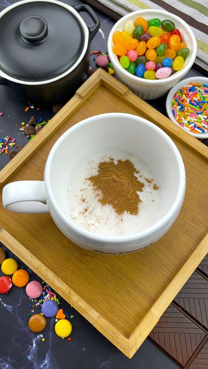 Step 1.1: In a large microwave-safe mug, combine flour, sugar, baking powder, salt, and [cinnamon](https://amzn