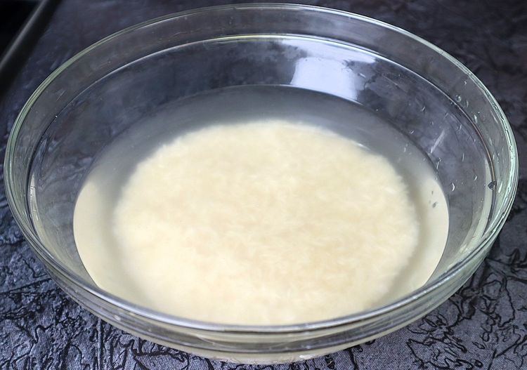 Step 1.6: Add basmati rice to a mixing bowl and rinse it 2-3 times