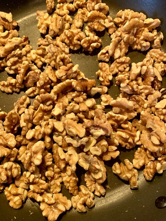 Step 1.1: Add the walnuts and dry roast for 3-4 minutes, stirring occasionally