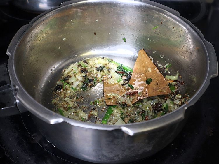 Step 1.5: Add ginger and garlic paste and sauté until the raw smell disappears
