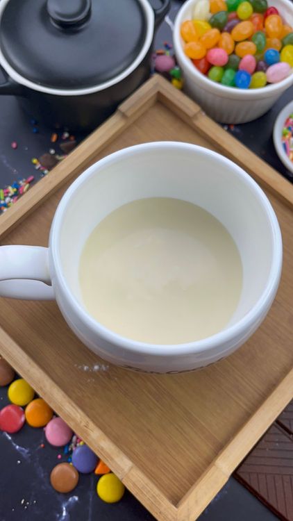 Step 3.1: Pour cheesecake batter over the crust (or directly into the mug if skipping crust)