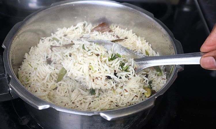Step 1.2: Once the rice is cooked perfectly and grains are separated, you can add ghee for flavor