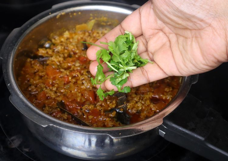 Step 1.1: Finally, add chopped coriander leaves and serve hot with rice, roti, naan, or biryani