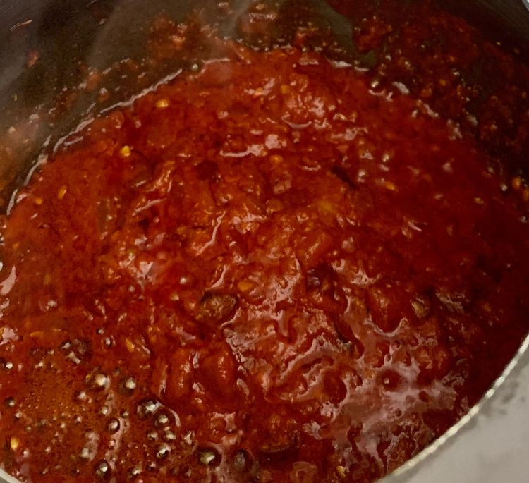 Step 1.1: Add tomatoes, coriander seeds, kashmiri red chilli powder, turmeric and salt