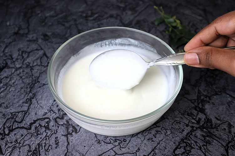 Step 1.5: In a bowl, add thick curd and whisk for 2 minutes until it reaches a creamy consistency