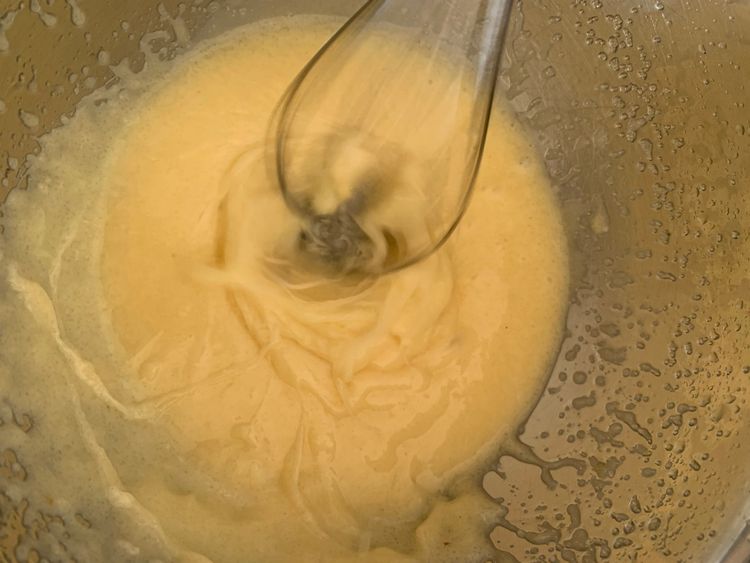 Step 1.2: Add the egg and vanilla extract to the oil-sugar mixture