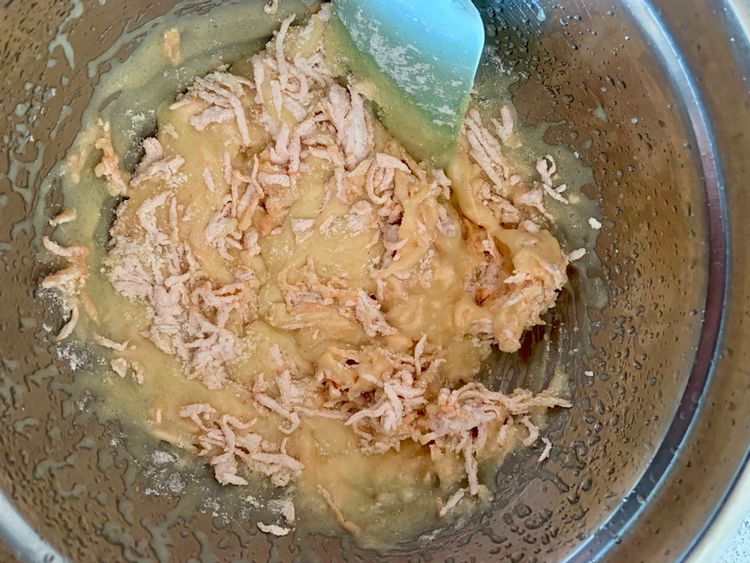 Step 1.1: Gradually incorporate the flour mixture into the wet ingredients, gently stirring with a spatula until a soft dough forms