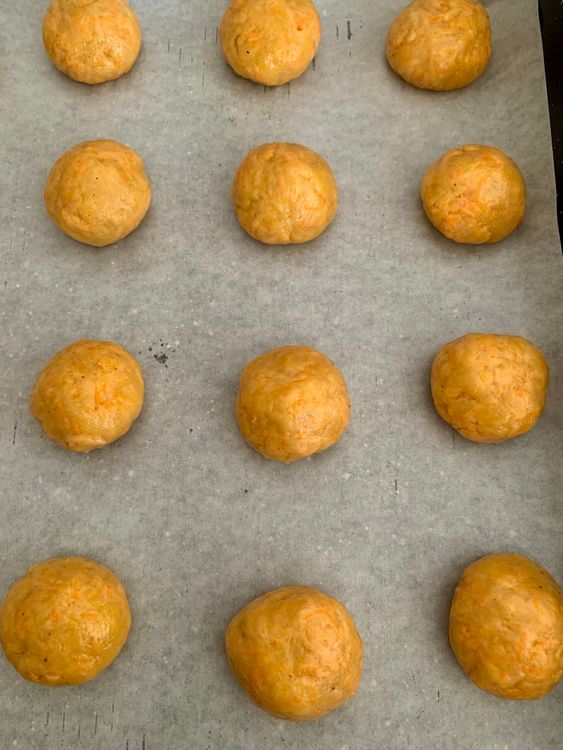 Step 1.2: Using a spoon or cookie scoop, shape small portions of the dough into walnut-sized balls