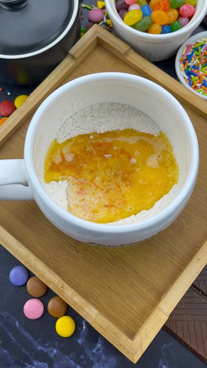 Step 1.1: Add the egg yolk, melted butter, orange juice, orange zest, and vanilla extract