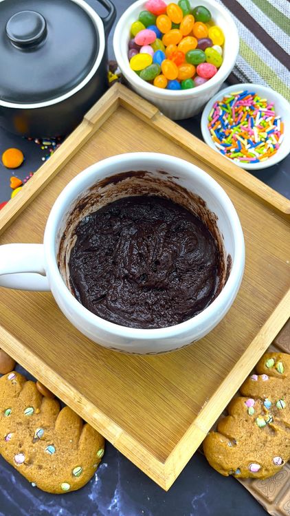 Step 1.1: Place a chocolate square in the center and gently cover with batter