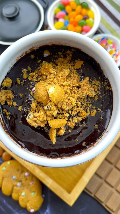 Step 1.1: Add the reserved cookie chunks, rainbow candies, or drizzle with melted chocolate