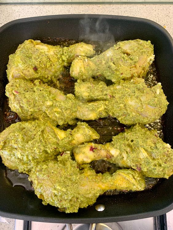 Step 3.1: Add the marinated chicken pieces and cook until the chicken is seared and starts to brown