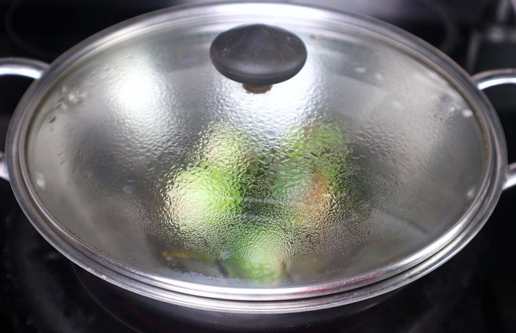 Step 2.4: Heat oil in a [thick-bottomed kadai ](https://amzn