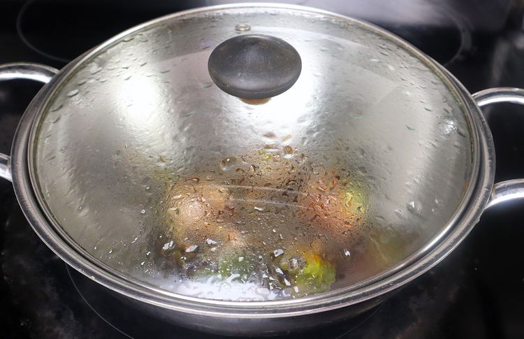 Step 2.1: Once browned, remove the brinjals and set aside