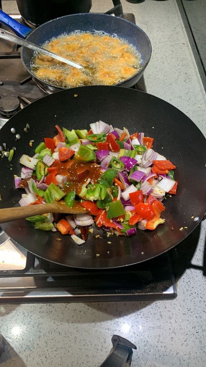 Step 3.1: Add tomato sauce, dark soy sauce, salt, white pepper, water, sambal sauce/green chilli sauce/red chilli sauce, and vinegar to the pan