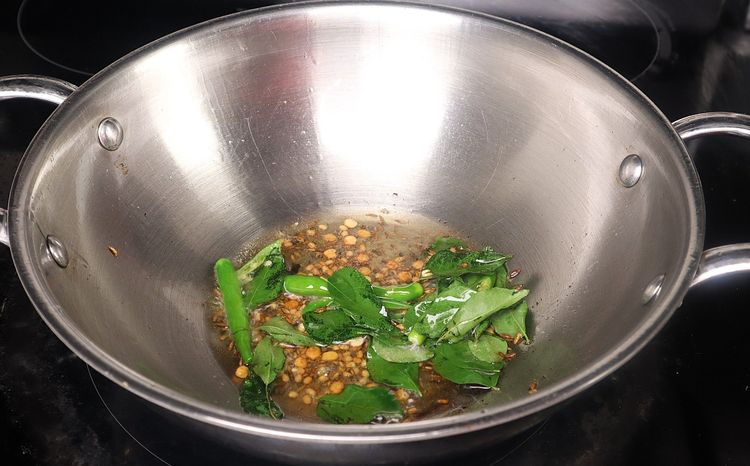 Step 2.3: Add chopped onion, green chili, and curry leaves