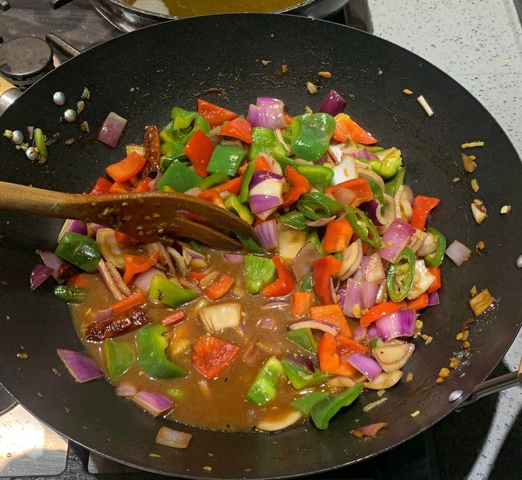 Step 3.3: Add tomato sauce, dark soy sauce, salt, white pepper, water, sambal sauce/green chilli sauce/red chilli sauce, and vinegar to the pan