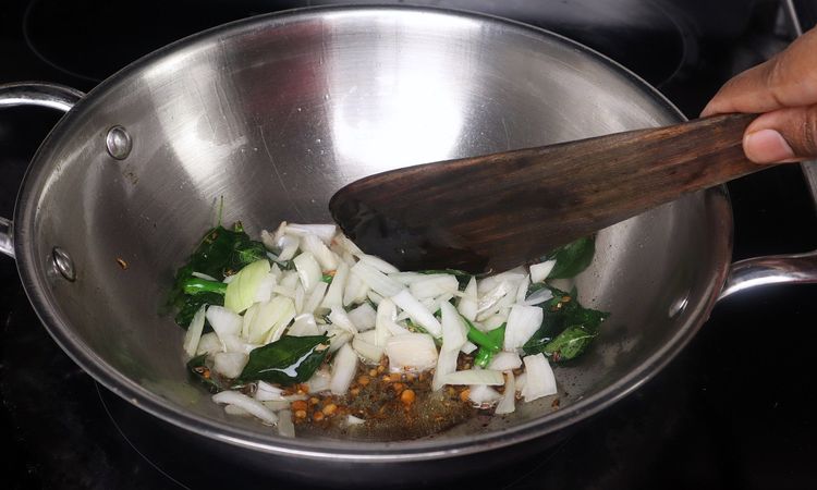 Step 2.5: Add chopped onion, green chili, and curry leaves