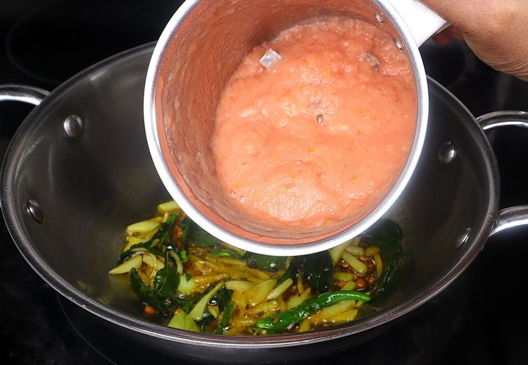 Step 2.3: Add turmeric powder to the kadai and sauté