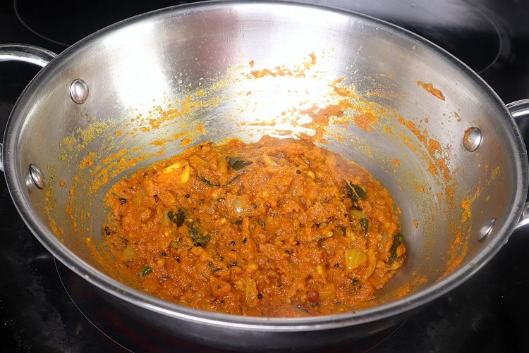 Step 2.7: Add red chili powder, salt, and coriander powder