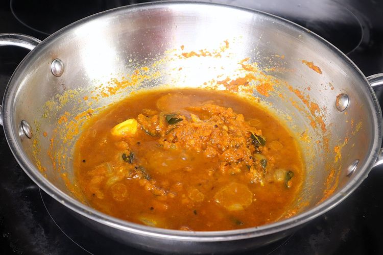 Step 2.2: Add tamarind pulp and sauté for a few minutes on medium to low flame until the curry thickens