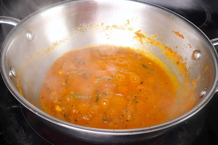 Step 2.4: Add tamarind pulp and sauté for a few minutes on medium to low flame until the curry thickens